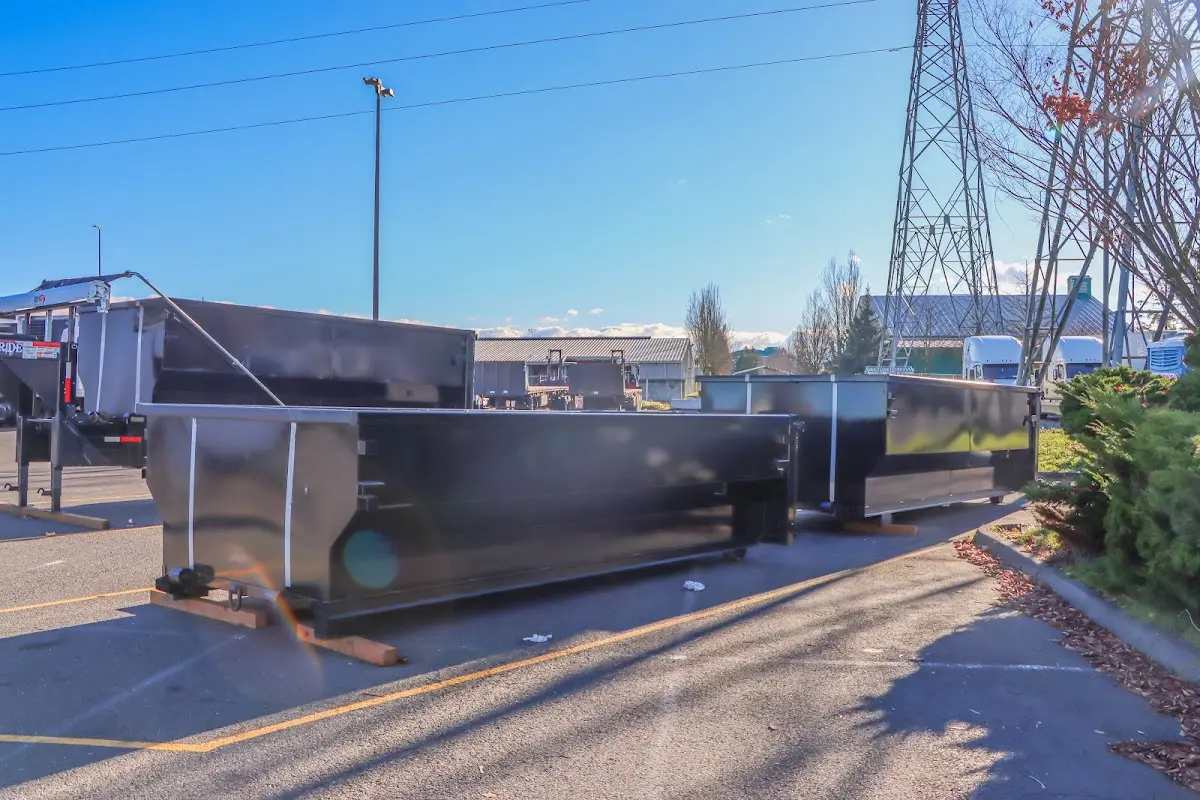 Roll-off dumpster ready for waste disposal at job site for 15 Yard Dumpster Rental in Bellwood